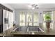 Bright kitchen with stainless steel appliances, granite countertops, and a large island with a sink at 21014 W Ridge Rd, Buckeye, AZ 85396