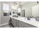 Contemporary bathroom with dual sinks, a long vanity, and lots of drawer space at 21022 E Arroyo Verde Ct, Queen Creek, AZ 85142