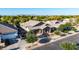 Beautiful home with a spacious driveway, well-maintained landscaping, and covered front porch at 21022 E Arroyo Verde Ct, Queen Creek, AZ 85142