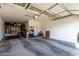 Spacious two-car garage with ample storage space and a functional layout for parking and projects at 21022 E Arroyo Verde Ct, Queen Creek, AZ 85142