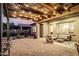 Outdoor patio area with string lights, sectional sofa and view of the backyard at 21022 E Arroyo Verde Ct, Queen Creek, AZ 85142