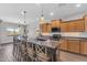 Spacious eat-in kitchen with a large island, modern appliances, and natural light at 23886 W Harrison Dr, Buckeye, AZ 85326