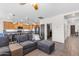 Open-concept kitchen and living area with modern finishes and ample natural light at 23886 W Harrison Dr, Buckeye, AZ 85326