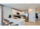 Well-equipped kitchen featuring stainless steel appliances, a breakfast bar and ample storage for culinary enthusiasts at 25038 N 174Th Ln, Surprise, AZ 85387