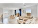 Bright living room with natural light, dining table, comfortable seating, and neutral-toned decor at 25082 N 174Th Ln, Surprise, AZ 85387