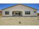 Low maintenance backyard with a patio and rock ground cover, perfect for easy care at 25162 N 177Th Dr, Surprise, AZ 85387