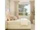 Relaxing bedroom featuring soft textures, a plush bed, and natural light at 25162 N 177Th Dr, Surprise, AZ 85387