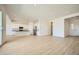 Open-concept living area with tile flooring, recessed lighting and seamless access to the kitchen at 25162 N 177Th Dr, Surprise, AZ 85387