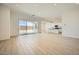 Spacious living area offers tile floors, recessed lights and access to the kitchen and outdoor living at 25162 N 177Th Dr, Surprise, AZ 85387