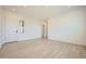 Bright living room featuring tile floors and a large window at 25162 N 177Th Dr, Surprise, AZ 85387