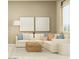 Cozy living room with plush sectional sofa, decorative pillows, and stylish decor at 25162 N 177Th Dr, Surprise, AZ 85387