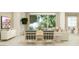 Cozy living room showcasing natural light, neutral color palette, chic decor, and stylish modern furnishings at 25162 N 177Th Dr, Surprise, AZ 85387