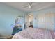 Bright bedroom with cartoon castle on wall, carpet flooring, and natural light at 2531 W Saint Catherine Ave, Phoenix, AZ 85041