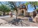 Charming two-story home with a spacious two car garage and desert landscaping at 2531 W Saint Catherine Ave, Phoenix, AZ 85041