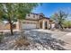 Charming two-story home with a spacious two car garage and desert landscaping at 2531 W Saint Catherine Ave, Phoenix, AZ 85041