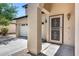 Close up of home's front door featuring security door and 'No Soliciting' sign at 2531 W Saint Catherine Ave, Phoenix, AZ 85041