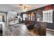 Spacious living area with wood-look floors and entertainment center at 2531 W Saint Catherine Ave, Phoenix, AZ 85041