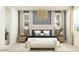 Beautiful bedroom showcasing a lovely chandelier, bedside tables with lamps, and stylish decor at 25437 N 176Th Ave, Surprise, AZ 85387