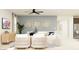 A bright living room featuring stylish furniture, a modern TV, and elegant decor, perfect for relaxation at 25437 N 176Th Ave, Surprise, AZ 85387