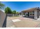 Spacious backyard with gravel, brick, and artificial turf perfect for entertaining guests at 2704 S 172Nd Ln, Goodyear, AZ 85338