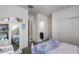 Bright bedroom with light walls offers views of a secondary bed and en-suite bath at 2704 S 172Nd Ln, Goodyear, AZ 85338