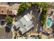 Bird's eye view showing house roof, backyard layout, pool, and surroundings at 2726 W Meseto Cir, Mesa, AZ 85202