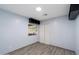 View of a cozy bedroom featuring wood-look flooring and a window at 2726 W Meseto Cir, Mesa, AZ 85202