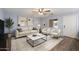 Living room showcasing modern decor and plenty of natural light at 2726 W Meseto Cir, Mesa, AZ 85202
