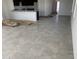 Open living area with tile flooring and natural light at 32002 N Pony Express Rd, San Tan Valley, AZ 85143