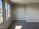 Bright bedroom with large windows offering plenty of natural light and comfortable carpeting at 3363 S 180Th Ln, Goodyear, AZ 85338