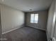 Cozy bedroom with soft carpeting, neutral paint, and great natural light at 3363 S 180Th Ln, Goodyear, AZ 85338