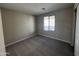 Comfortable bedroom with soft carpeting, and neutral paint at 3363 S 180Th Ln, Goodyear, AZ 85338