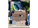 Aerial view showcases the home, private backyard oasis with pool, patio area, and perimeter landscaping at 3444 E Paradise Dr, Phoenix, AZ 85028