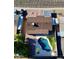 Aerial view of a house featuring a private backyard oasis with a refreshing pool, patio, and lush landscaping at 3444 E Paradise Dr, Phoenix, AZ 85028
