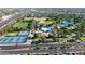 Beautiful aerial view of a neighborhood adjacent to recreational facilities including tennis courts and a park at 3444 E Paradise Dr, Phoenix, AZ 85028