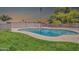 Private backyard features a sparkling pool, perfect for relaxing and entertaining outdoors at 3444 E Paradise Dr, Phoenix, AZ 85028
