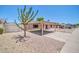 Single-story home with a carport and low maintenance desert landscaping at 3444 E Paradise Dr, Phoenix, AZ 85028