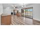 Open concept kitchen features wood-look floors and modern appliances at 3444 E Paradise Dr, Phoenix, AZ 85028