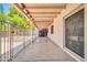 Spacious, covered patio featuring a storage shed in the backyard at 3444 E Paradise Dr, Phoenix, AZ 85028