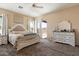 Tranquil primary bedroom featuring a sliding glass door to the backyard and neutral decor at 35414 N 32Nd Dr, Phoenix, AZ 85086