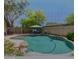 Beautiful in-ground residential pool is surrounded by a brick fence providing a secure and tranquil outdoor oasis at 35414 N 32Nd Dr, Phoenix, AZ 85086