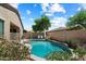 A lovely backyard pool with desert landscaping and comfortable seating to enjoy the sunshine at 35414 N 32Nd Dr, Phoenix, AZ 85086