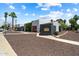 Wide shot of a modern home, showcasing the desert landscaping and mailbox location at 3551 N 12Th St # 101, Phoenix, AZ 85014
