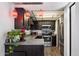 The kitchen features stainless steel appliances, granite countertops, and pendant lighting at 3551 N 12Th St # 101, Phoenix, AZ 85014