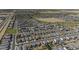 Neighborhood with uniform single-Gathering homes and desert landscape in an aerial shot at 36602 W San Alvarez Ave, Maricopa, AZ 85138