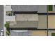Overhead shot of a roof, driveway, and front yard with simple landscaping at 36602 W San Alvarez Ave, Maricopa, AZ 85138