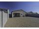 Gravel backyard with a covered patio at 36602 W San Alvarez Ave, Maricopa, AZ 85138