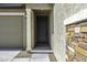 Inviting front entrance featuring a stylish door, stone accents, and a welcoming porch, creating a great first impression at 36602 W San Alvarez Ave, Maricopa, AZ 85138