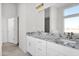 Bathroom featuring granite countertops and dual sinks at 37504 W Elm Ave, Tonopah, AZ 85354