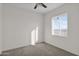 Bedroom with neutral walls, carpet, and a bright window at 37504 W Elm Ave, Tonopah, AZ 85354